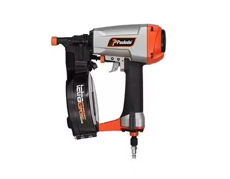 A Black and Orange Nail Gun that says paslode on the side