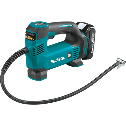 Makita power tool with a coiled cable on a white background