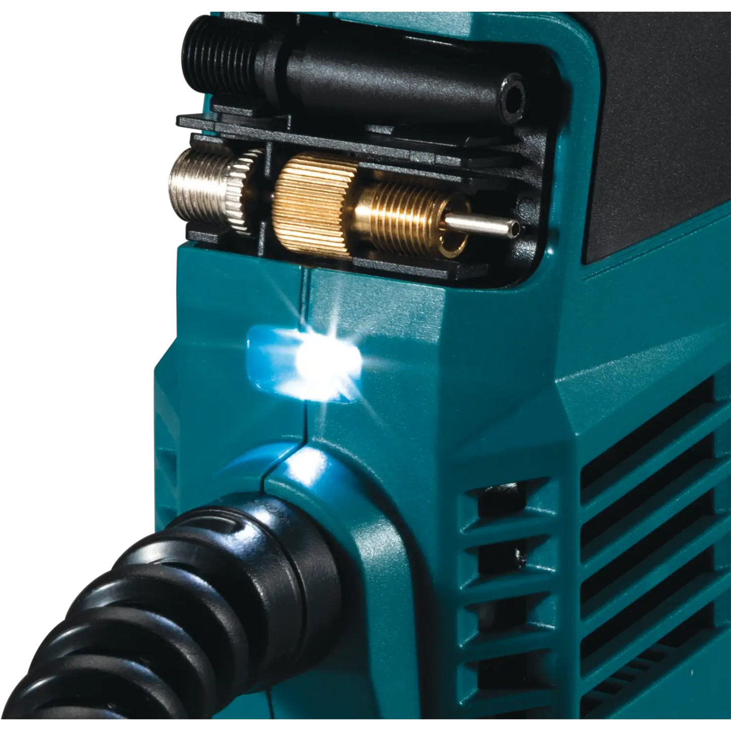 Close-up of a teal power tool with a black nozzle and brass fitting on a white background