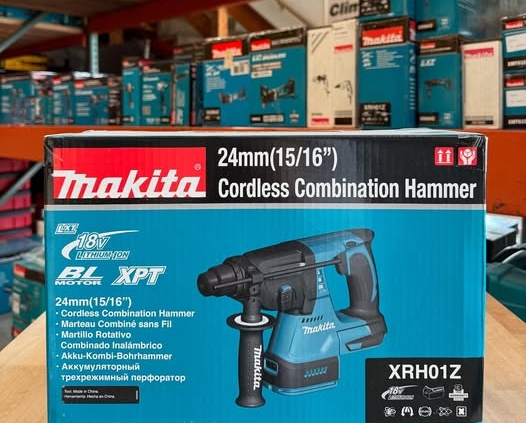 Makita XRH01Z 18V LXT Cordless Combination Hammer displayed on a warehouse shelf, with other Makita tool boxes stacked in the background.