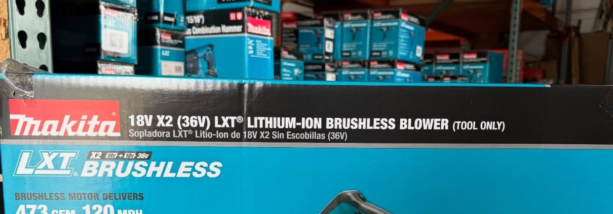 Makita Xbu02z with other makita tools in the background on orange shelving