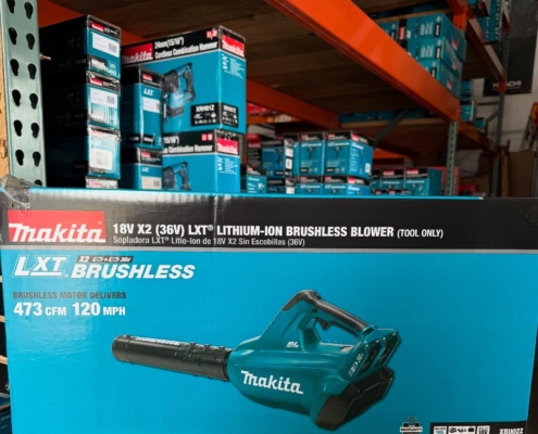 Makita Xbu02z with other makita tools in the background on orange shelving